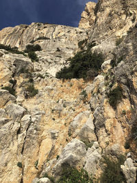 Low angle view of rocky mountains