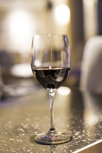 Close-up of wine glass on table