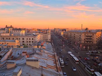 High angle view of city street and buildings against sky