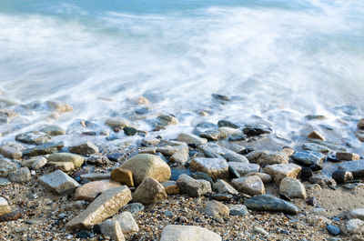 Close-up of pebbles on beach