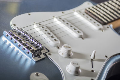 Cut tight macro of a electric guitar