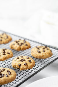 Close-up of cookies against white background