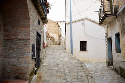 Narrow alley amidst old buildings