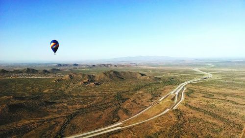 Scenic view of mountains against cloudy sky