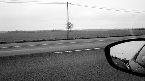 Close-up of road against sky