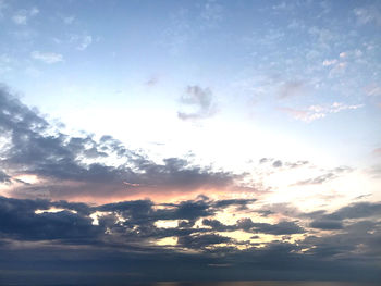 Low angle view of clouds in sky during sunset