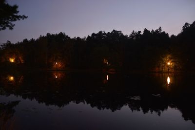 Scenic view of calm lake against sky