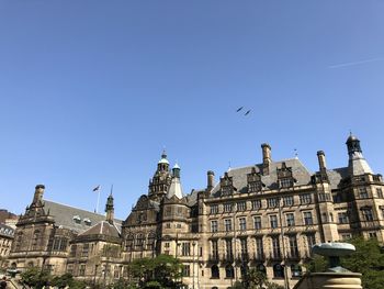 Low angle view of sheffield townhall buildings in city