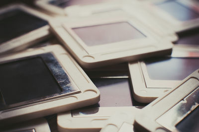 Close-up of hand mirrors on table