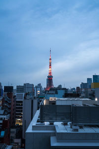 Modern buildings in city against sky