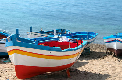 High angle view of boats moored on beach