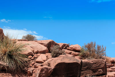 Low angle view of rock formation against sky