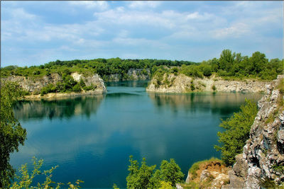 Scenic view of river against sky