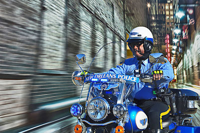 Man riding motorcycle in city