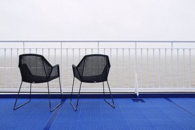 Close-up of empty chairs