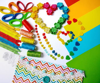 High angle view of multi colored candies on table