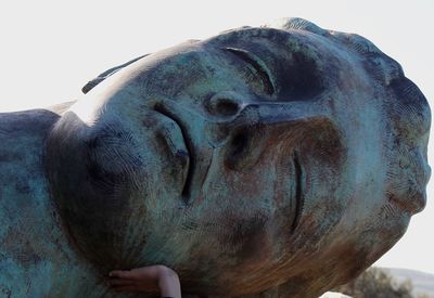 Close-up of statue against clear sky