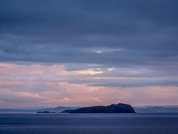 View of calm sea at sunset