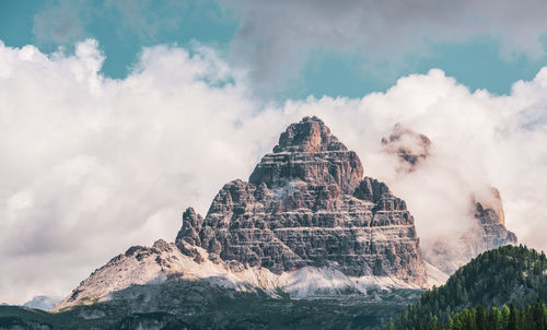 Clouds over mountain peaks in the dolomites, italy.