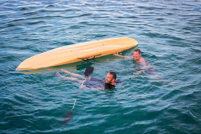 People enjoying in sea