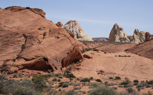 Rock formations in desert against sky