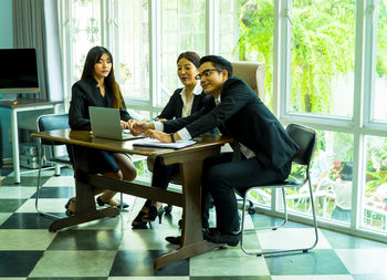 Business colleagues in board room during meeting