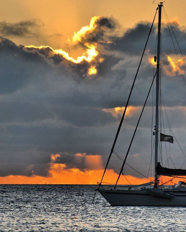 sunset, sea, nautical vessel, sky, water, transportation, boat, mode of transport, scenics, cloud - sky, beauty in nature, waterfront, orange color, tranquility, tranquil scene, horizon over water, sailboat, nature, idyllic, cloud
