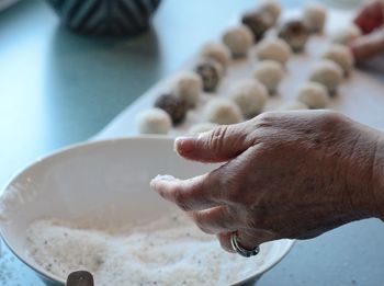 Close-up of person preparing food