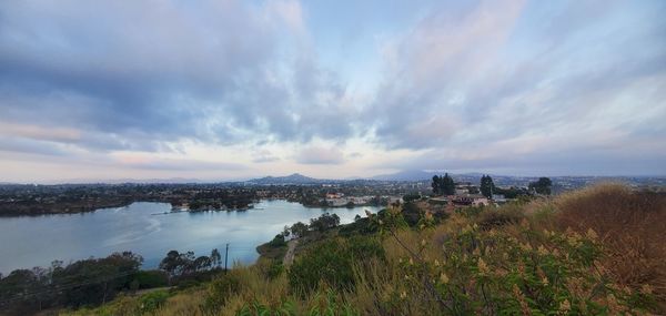 Panoramic view of buildings and city against sky