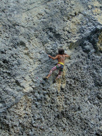 High angle view of woman on rock