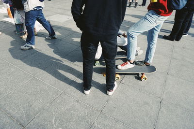 Low section of people standing on floor