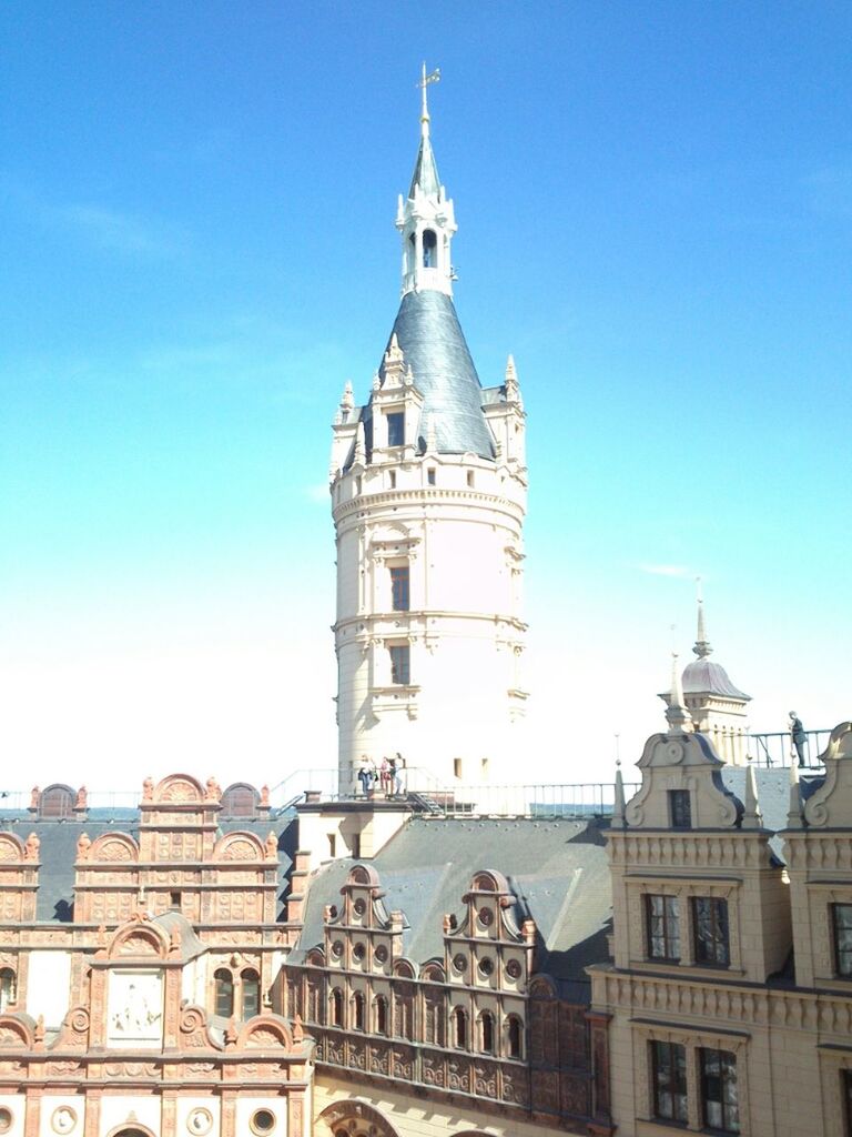 building exterior, architecture, built structure, religion, place of worship, church, spirituality, blue, low angle view, clear sky, cathedral, dome, tower, cross, travel destinations, famous place, spire, day