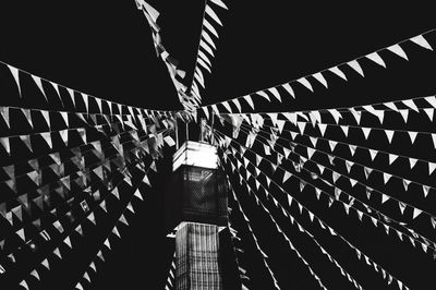 Low angle view of decorations hanging on ceiling in building