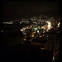 Illuminated cityscape at night