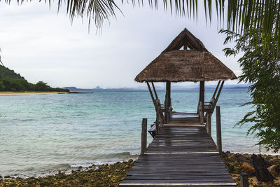 Wooden floor on sea view and beach at koh talu island, prachuap khiri khan, thailand