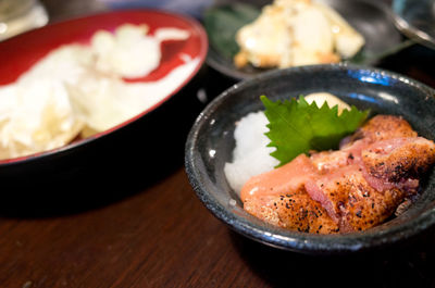 Close-up of fish served on table