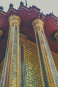 Low angle view of illuminated building against sky