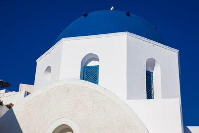 Traditional architecture of the churches of the oia city in santorini island