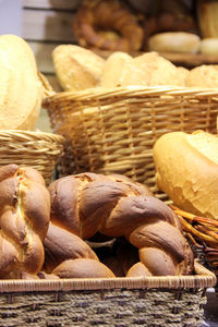 Close-up of breads in wicker baskets for sale