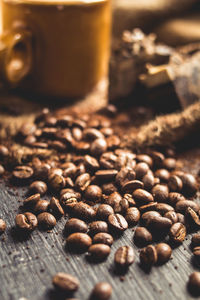 Close-up of coffee beans on table