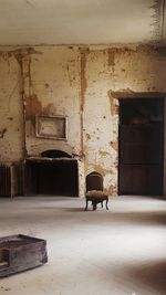 Empty chairs in abandoned room