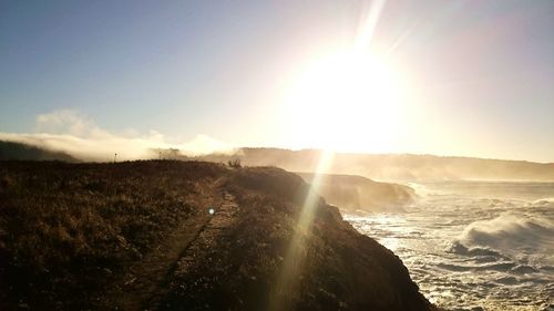 Sun shining through clouds