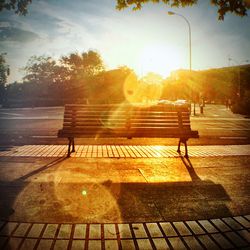 Shadow of person on footpath at sunset