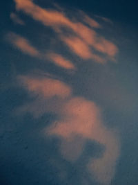 Low angle view of dramatic sky during sunset
