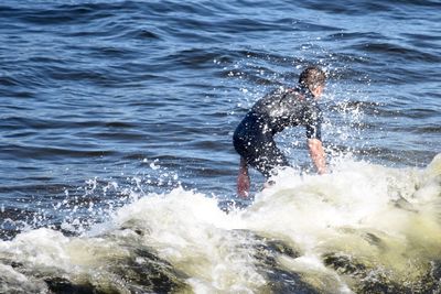 Man surfing in sea