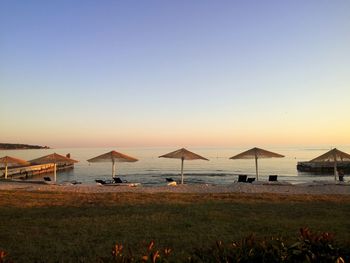 Scenic view of sea against clear sky during sunset