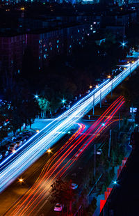 High angle view of illuminated city street at night