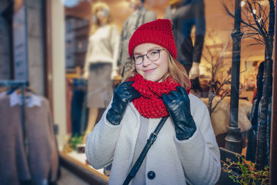 Portrait of young woman wearing hat