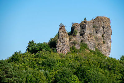 Auberg rock as part of the gerolsteiner dolomites. viewpoint to the village gerolstein, germany