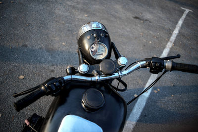 High angle view of motorcycle on road